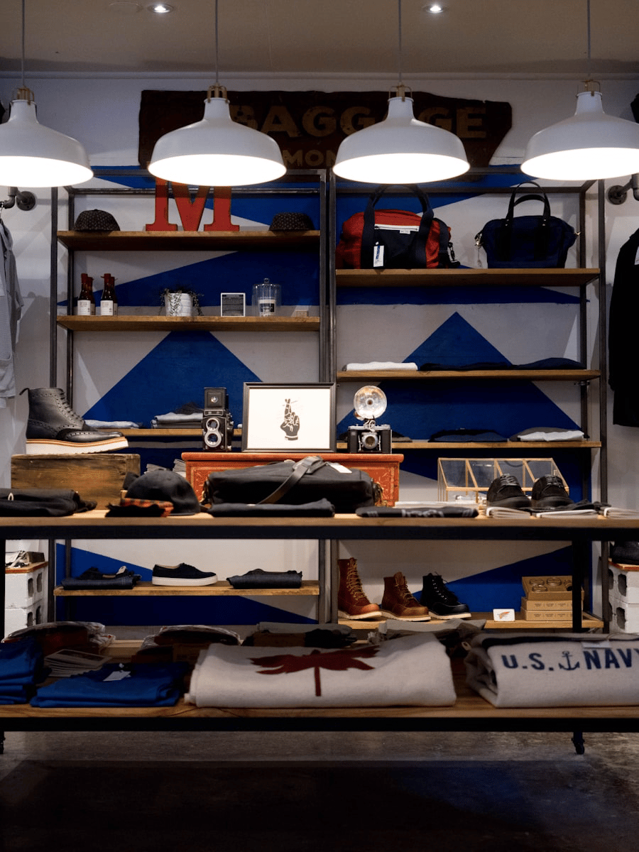 Clothing racks in a retail store aisle